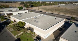 Printing company buys warehouse