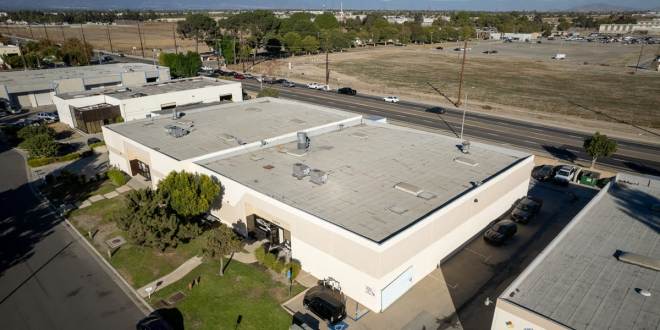 Printing company buys warehouse